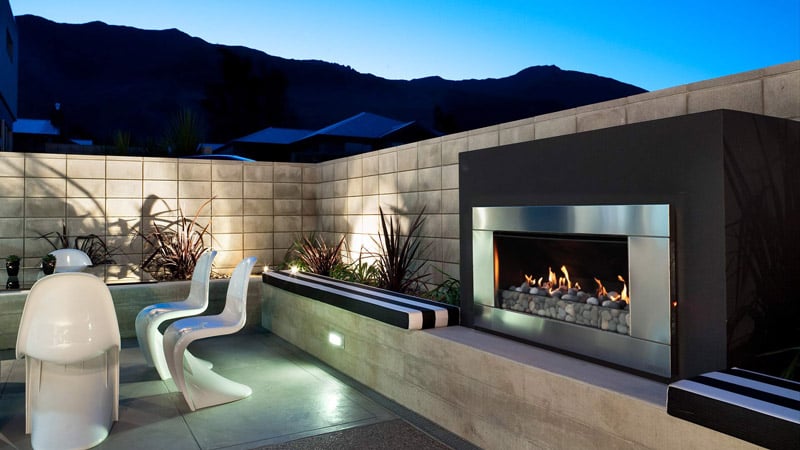 What is the difference between open and glass fronted fireplaces?