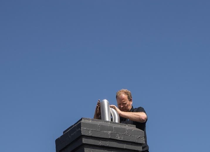 Installing flue down chimney